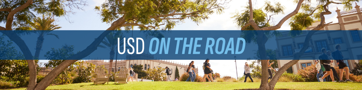 "USD ON THE ROAD" over a photo of USD's campus as student's walk to class.